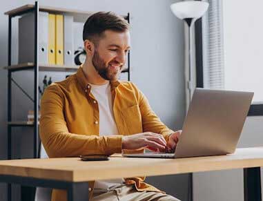 Guy On Computer Looking At Motor Rocket